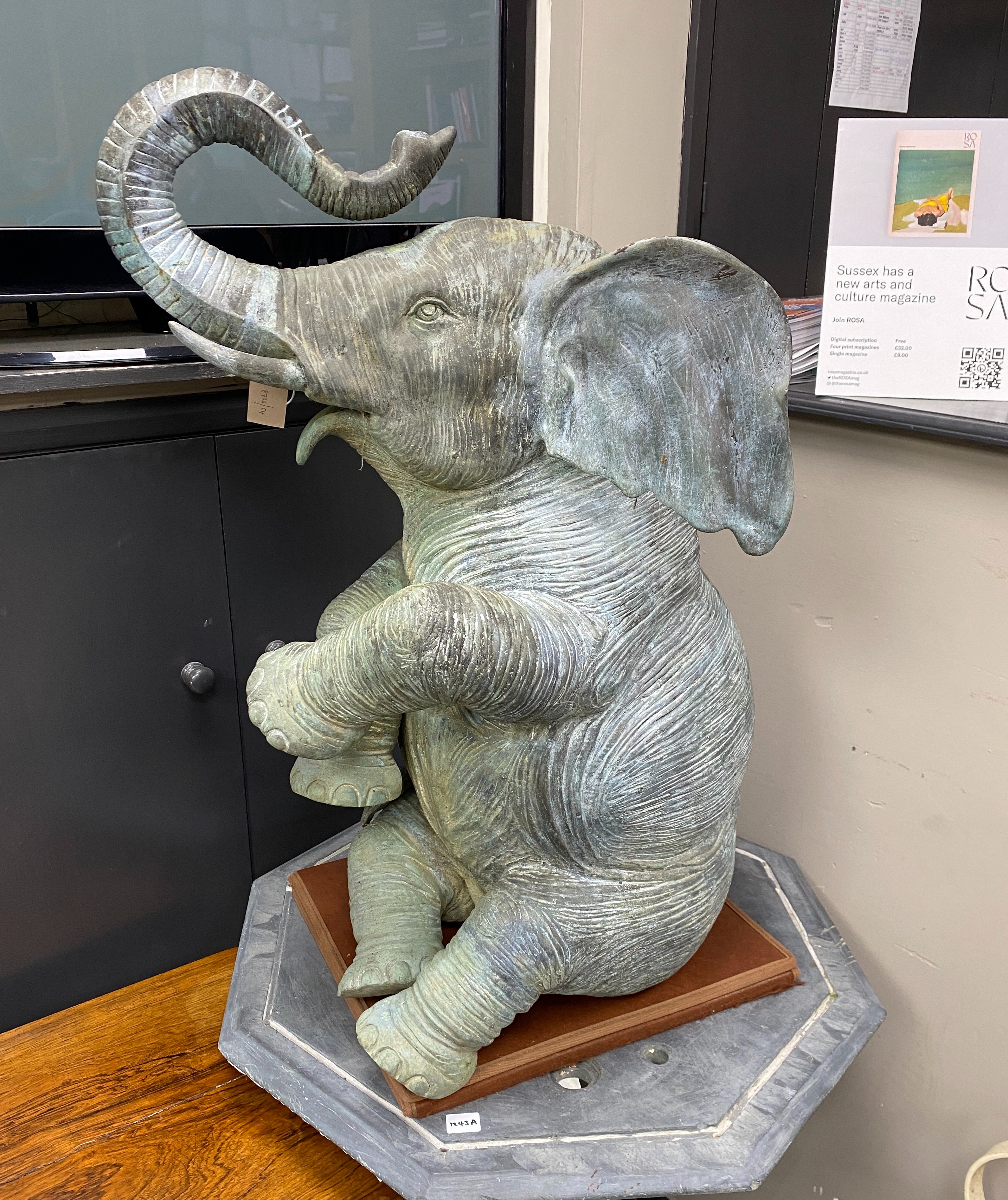 A bronze baby elephant garden fountain, height 87cm